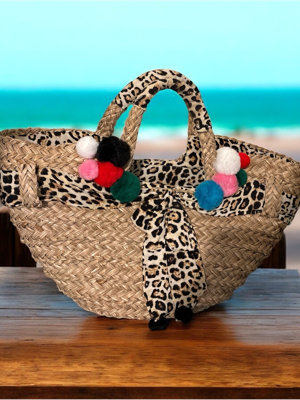 Straw Tote with Colorful Pom-Poms - resort vacation bag